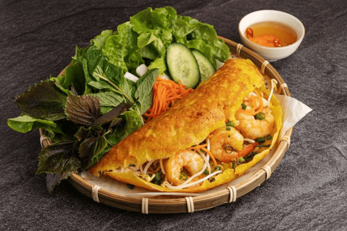 10 Món Ăn Đường Phố Việt Nam "Đốn Tim" Du Khách 5. Bánh Xèo: Âm Thanh Giòn Tan, Hương Vị Béo Ngậy